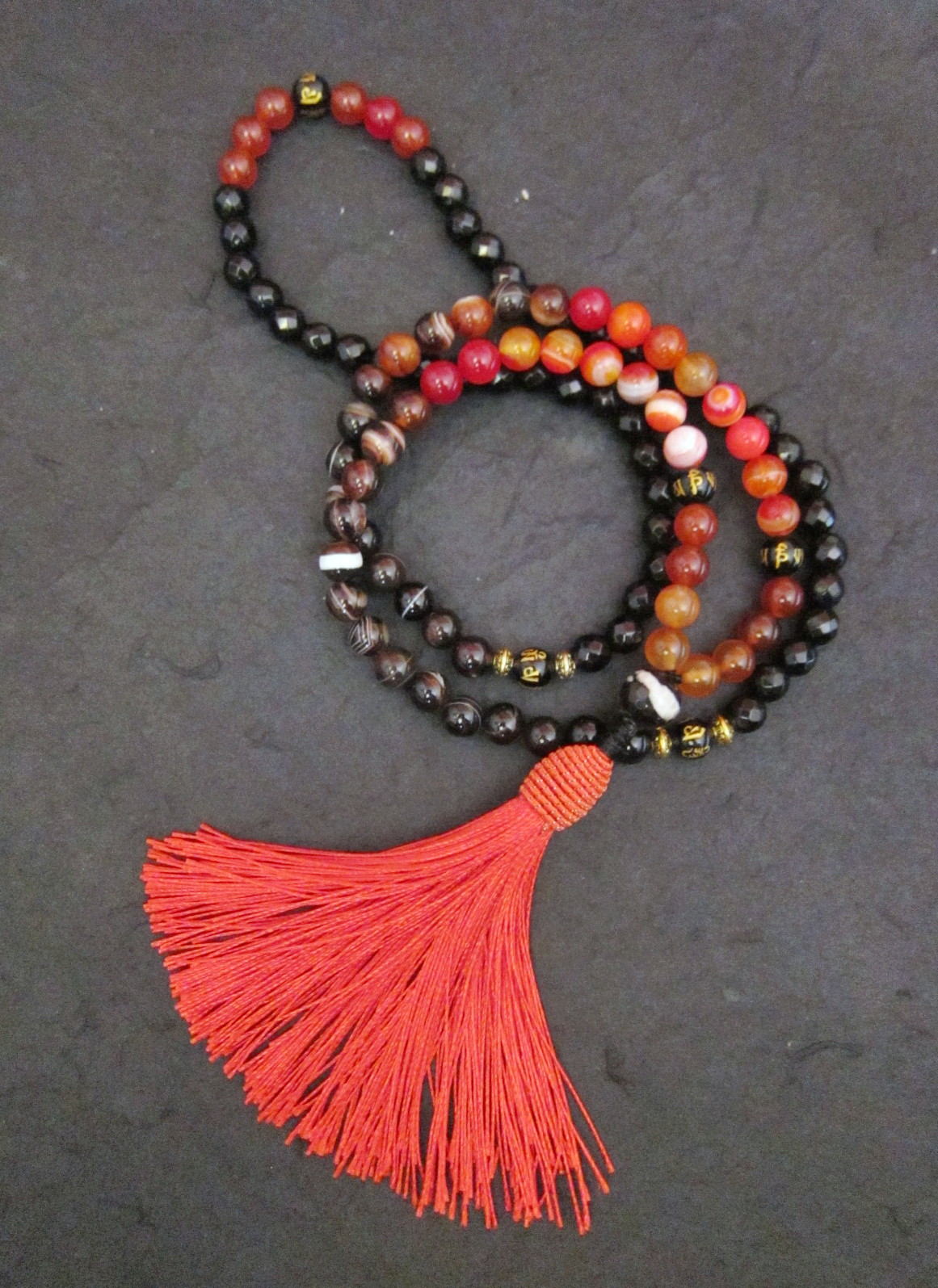 108 Mala Beaded Necklace In Red Orange Brown Line Agate, Carnelian, Tibetan Script (guru) W/ Tassel Necklace